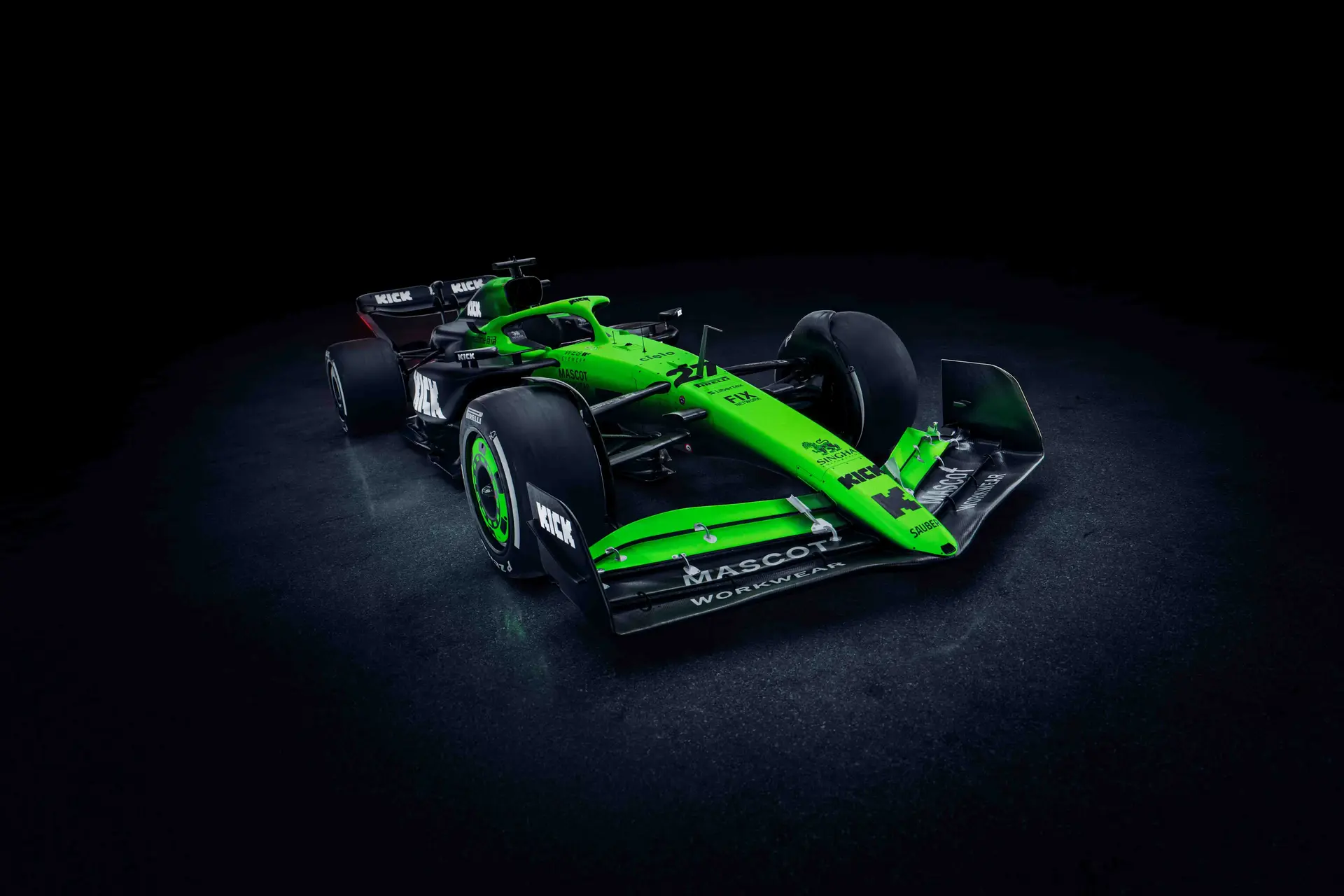 Three-quarter front-right view of the Sauber C45 Formula 1 car, highlighting its aerodynamic nose, front wing, and vibrant green and black livery.