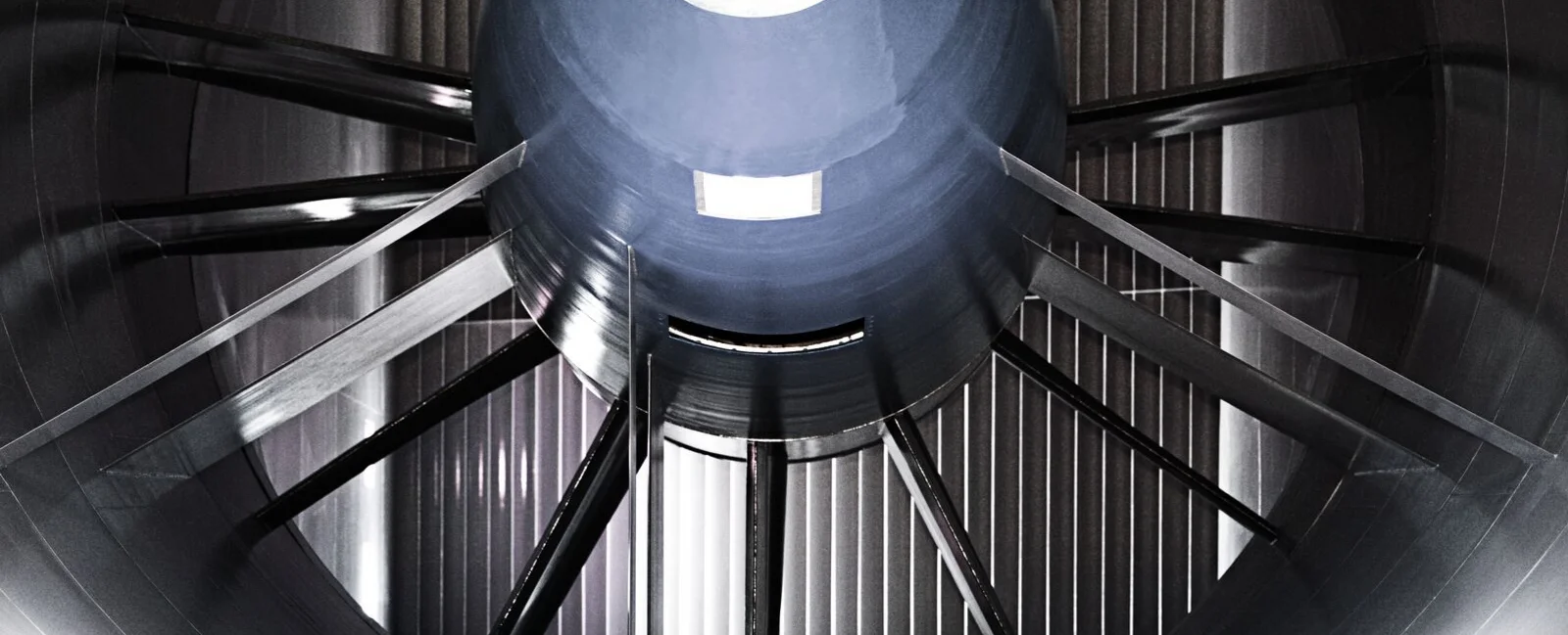 A high-tech wind tunnel facility at the Sauber F1 Team factory in Hinwil, Switzerland, used for aerodynamic testing and development of Formula 1 race cars.