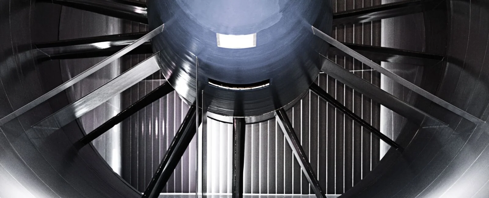 A high-tech wind tunnel facility at the Sauber F1 Team factory in Hinwil, Switzerland, used for aerodynamic testing and development of Formula 1 race cars.
