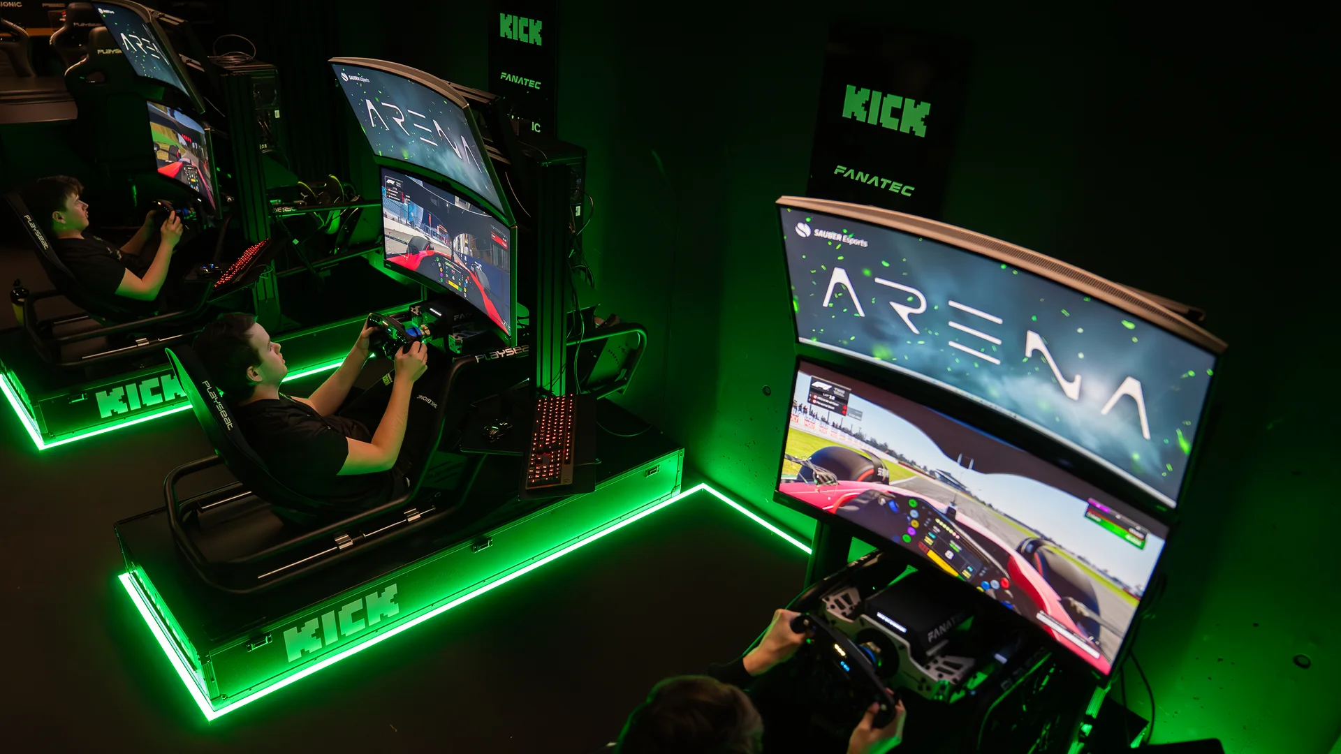 Professional esports players competing in an illuminated gaming arena with high-tech setups and multiple screens.