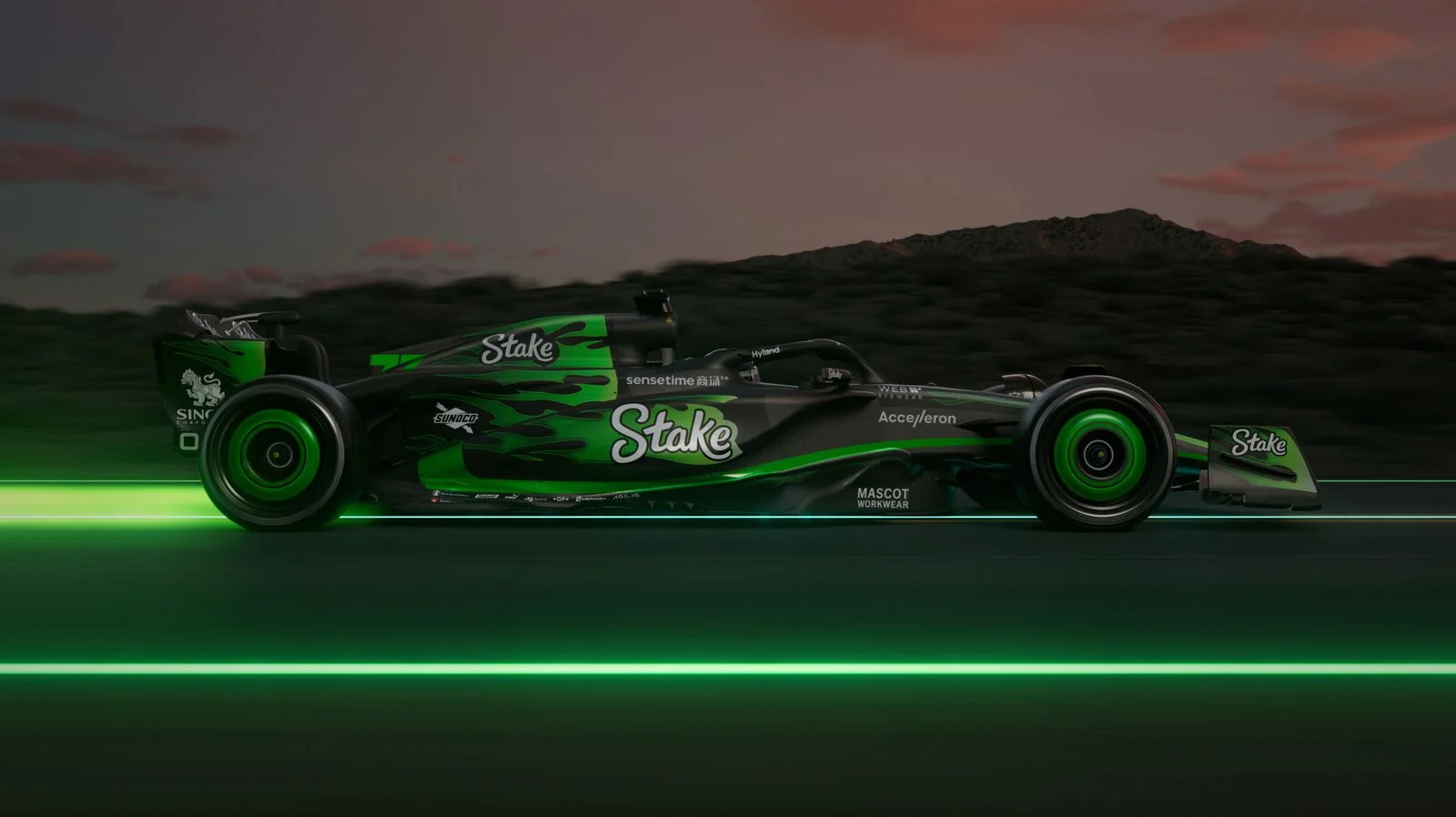 A stunning right-side view of the C44 Formula 1 car in motion, featuring a fire trail effect and Stake branding, captured in low-light conditions for a dynamic racing aesthetic.