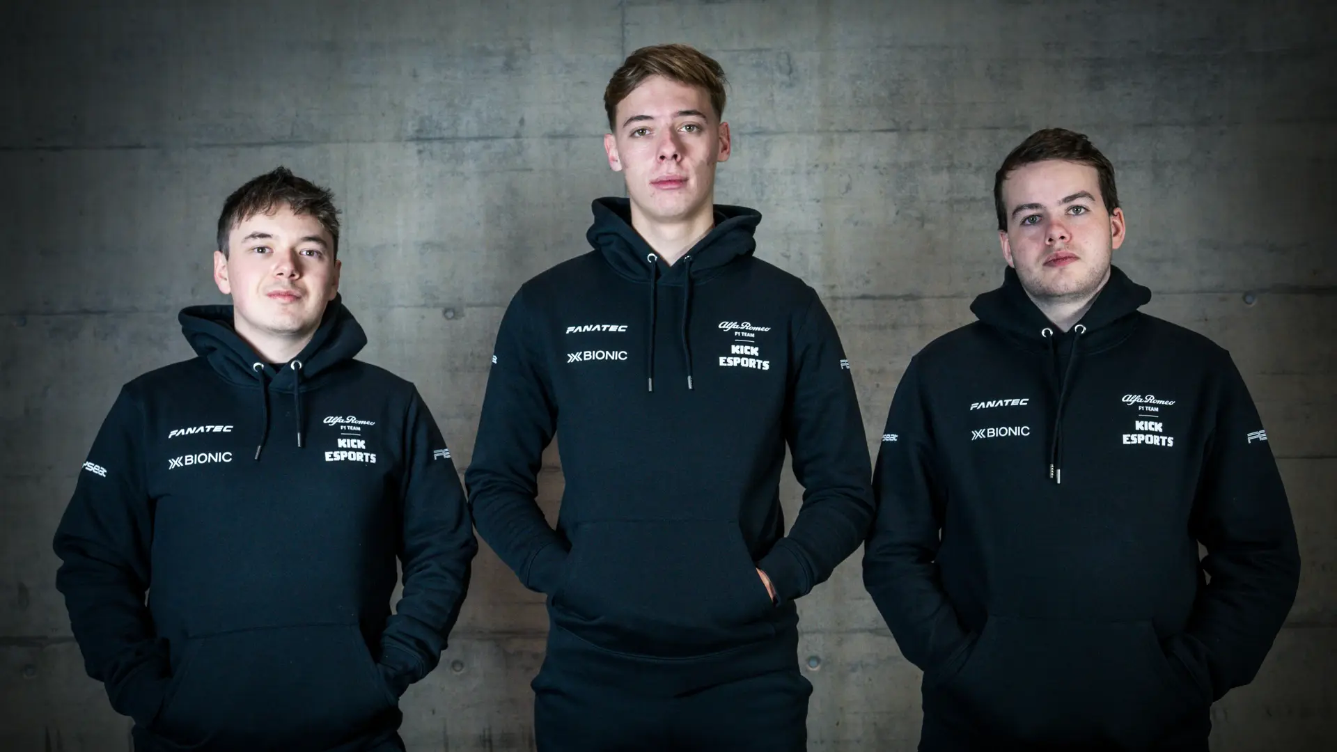 Thomas Ronhaar, Brendon Leigh, and third Sauber Motorsport Esports driver standing side by side in team jackets for the 2025 season.