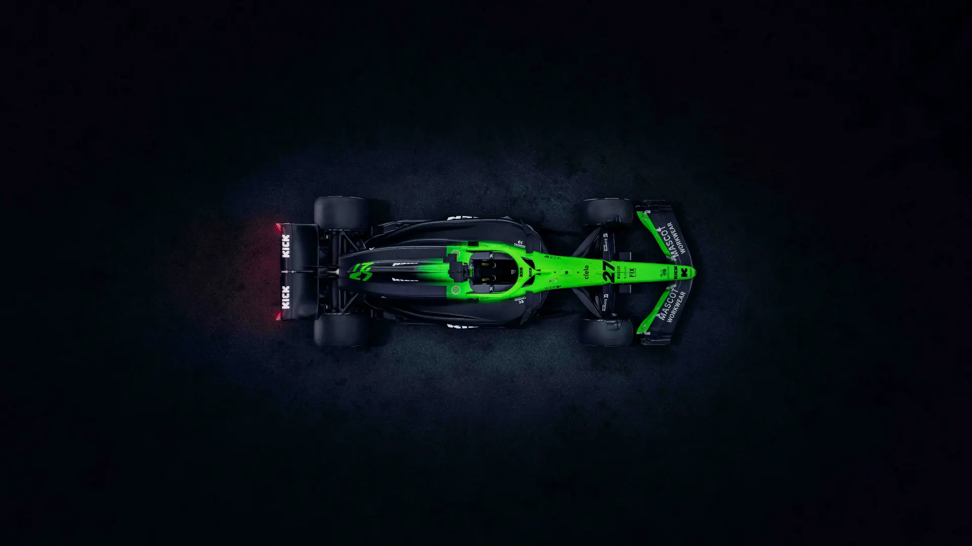 Top-down view of the Sauber C45 Formula 1 car, showcasing its aerodynamic design, bright green livery, and sponsor logos against a dark background.