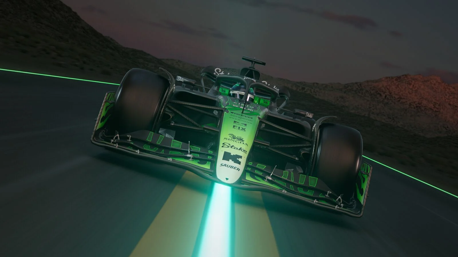 A dramatic low-angle front view of the C44 Formula 1 car, featuring a fire trail effect and Stake sponsorship, highlighting aerodynamics and night-time racing aesthetics.